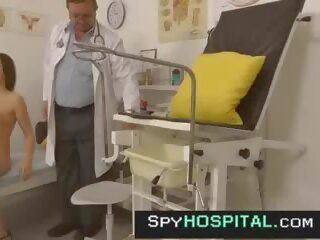 Charming eighteen checked by old gyno medical practitioner hidden cam