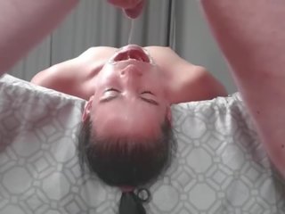 Upside down piss loving bitch laying face down from bed swallows piss in two non identical camera angles